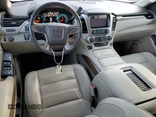 2019 GMC Yukon Denali with VIN 1GKS1CKJ8KR353280, listed as a Copart auction lot 77316454 with 74,476 mi miles and Salvage Title. Bid and sale history available at carsss.com. Image 8.