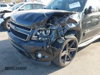 2014 Chevrolet Tahoe LT with VIN 1GNSCBE0XER202150, listed as a IAAI auction lot 41922771 with 168,693 mi miles and . Bid and sale history available at DreamBid. Image 6.