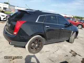 2015 Cadillac SRX Performance Collection with VIN 3GYFNCE32FS558430, listed as a Copart auction lot 63633865 with 153,729 mi miles and Salvage title. Bid and sale history available at DreamBid. Image 3.