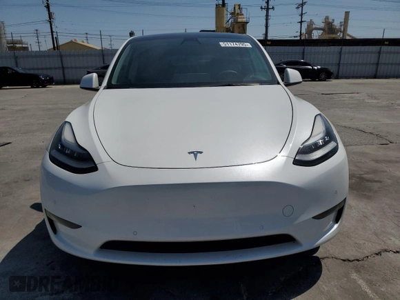2022 Tesla Model Y Long Range z VIN 7SAYGDEE2NF513823, wystawiony jako Copart lot #51174795 z przebiegiem 28 143 mil mil oraz Szkody całkowita. Historia ofert i sprzedaży dostępna na DreamBid. Obrazek 5.