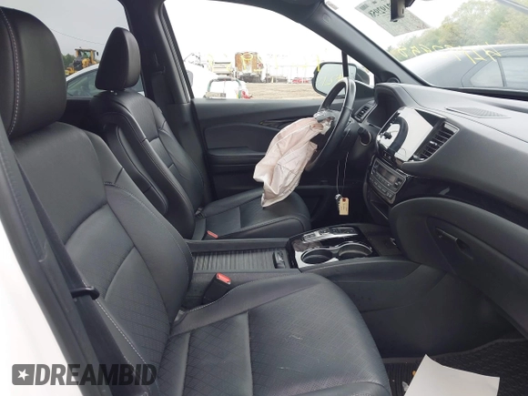 2023 Honda Passport Elite with VIN 5FNYF8H00PB022743, listed as a IAAI auction lot 42192958 with 25,165 mi miles and . Bid and sale history available at DreamBid. Image 5.