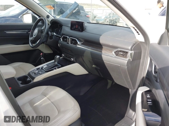 2019 Mazda CX-5 Grand Touring with VIN JM3KFBDM8K0518576, listed as a IAAI auction lot 41854296 with 88,706 mi miles and . Bid and sale history available at carsss.com. Image 5.