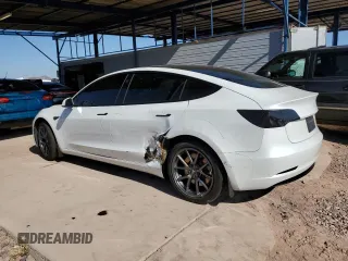 2021 Tesla Model 3 Standard Range Plus with VIN 5YJ3E1EA7MF978749, listed as a Copart auction lot 43377955 with 51,871 mi miles and Salvage Title. Bid and sale history available at carsss.com. Image 2.
