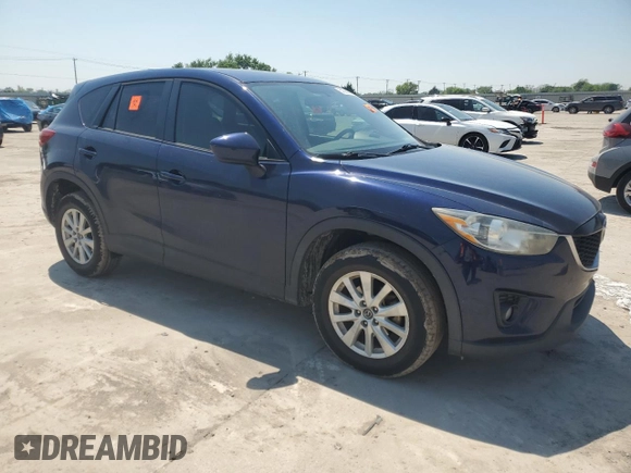 2014 Mazda CX-5 Touring z VIN JM3KE2CYXE0327950, wystawiony jako Copart lot #51390585 z przebiegiem 129 523 mil mil oraz Czysty tytuł • Clean title. Historia ofert i sprzedaży dostępna na DreamBid. Obrazek 4.