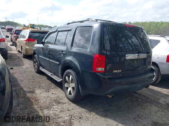 2012 Honda Pilot Touring with VIN 5FNYF4H92CB051260, listed as a IAAI auction lot 41906802 with 256,691 mi miles. Bid and sale history available at carsss.com. Image 3.