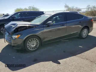 2016 Ford Fusion SE Hybrid with VIN 3FA6P0LU3GR307666, listed as a Copart auction lot 57444365 with 127,786 mi miles and Salvage title. Bid and sale history available at DreamBid. Image 1.