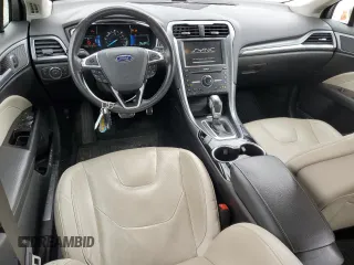 2016 Ford Fusion Titanium Hybrid with VIN 3FA6P0RUXGR192149, listed as a Copart auction lot 54270795 with 175,260 mi miles and Salvage title. Bid and sale history available at DreamBid. Image 8.