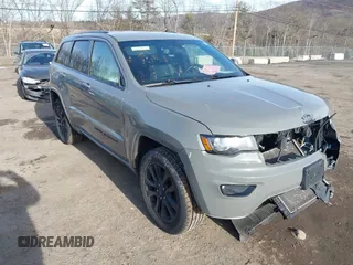 2020 Jeep Grand Cherokee Altitude with VIN 1C4RJFAG7LC305484, listed as a IAAI auction lot 41486841 with 65,646 mi miles. Bid and sale history available at carsss.com. Image 1.