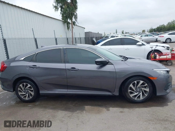 2017 Honda Civic EX z VIN 19XFC2F79HE036578, wystawiony jako IAAI lot #42380559 z przebiegiem 73 943 mil mil oraz . Historia ofert i sprzedaży dostępna na DreamBid. Obrazek 13.