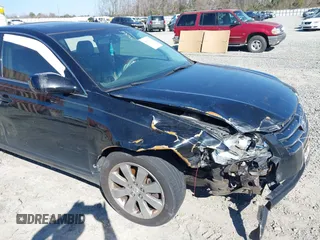 2005 Toyota Avalon XL with VIN 4T1BK36B25U012191, listed as a IAAI auction lot 38785162 with 230,071 mi miles and . Bid and sale history available at carsss.com. Image 6.
