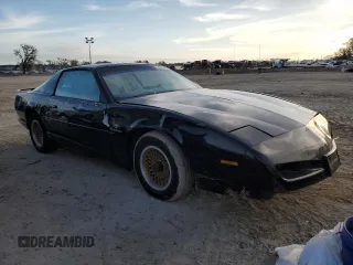 1992 Pontiac Firebird z VIN 1G2FS23T0NL203325, wystawiony jako Copart lot #76359414 z przebiegiem 198 651 mil mil oraz Nie do naprawy • Non repairable. Historia ofert i sprzedaży dostępna na DreamBid. Obrazek 4.