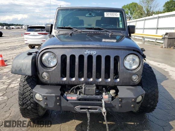 2017 Jeep Wrangler Willys Wheeler with VIN 1C4AJWAG2HL527192, listed as a Copart auction lot 58169245 with 88,737 mi miles and Salvage title. Bid and sale history available at DreamBid. Image 5.