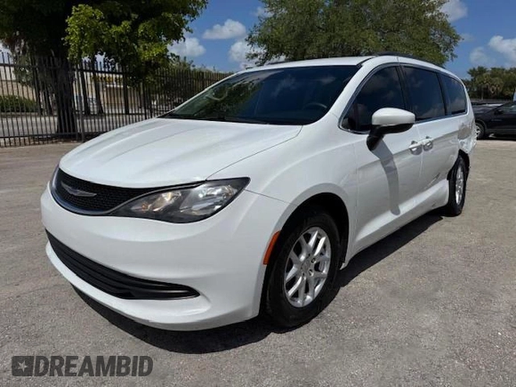 2020 Chrysler Voyager LXI with VIN 2C4RC1DG9LR144605, listed as a Copart auction lot 54107585 with 140,575 mi miles and Salvage Title. Bid and sale history available at carsss.com. Image 1.