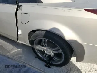 2006 Cadillac XLR z VIN 1G6YV36AX65603381, wystawiony jako Copart lot #77526894 z przebiegiem Nie podano mil oraz Nie do naprawy. Historia ofert i sprzedaży dostępna na DreamBid. Obrazek 12.