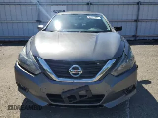 2016 Nissan Altima S z VIN 1N4AL3AP0GC219354, wystawiony jako Copart lot #58591145 z przebiegiem 87 715 mil mil oraz Szkoda całkowita • Salvage title. Historia ofert i sprzedaży dostępna na DreamBid. Obrazek 5.