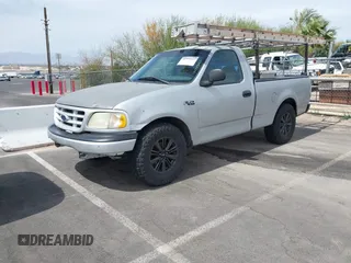 2003 Ford F-150 XL with VIN 1FTRF17273NB08996, listed as a IAAI auction lot 41799869 with Not Provided miles and . Bid and sale history available at DreamBid. Image 2.