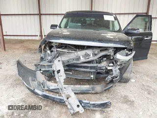2018 Ford Flex Limited with VIN 2FMGK5D87JBA02782, listed as a IAAI auction lot 41725090 with 138,479 mi miles. Bid and sale history available at carsss.com. Image 6.