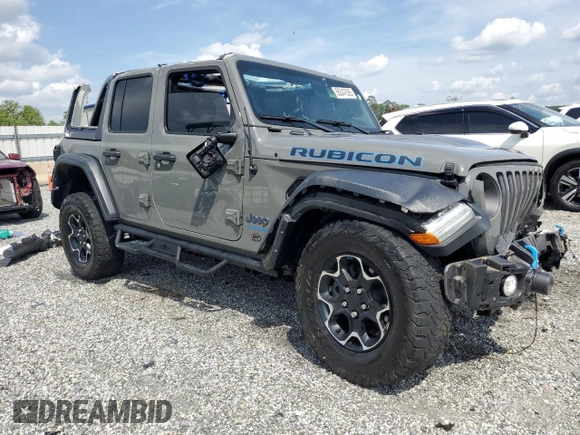 2022 Jeep Wrangler Unlimited Rubicon with VIN 1C4JJXR69NW206276, listed as a Copart auction lot 55247595 with 39,273 mi miles and Salvage title. Bid and sale history available at DreamBid. Image 4.