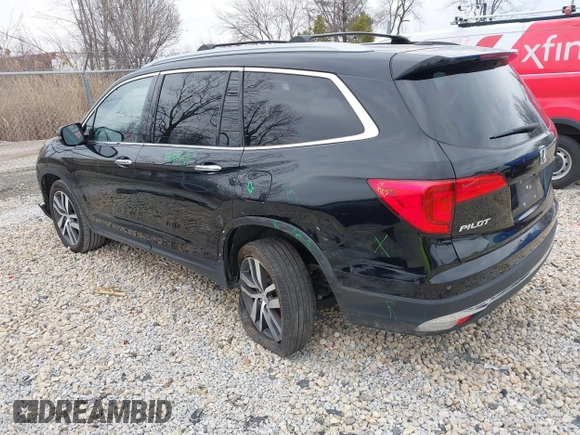 2017 Honda Pilot Touring with VIN 5FNYF6H90HB051700, listed as a IAAI auction lot 41902075 with 69,712 mi miles. Bid and sale history available at carsss.com. Image 3.