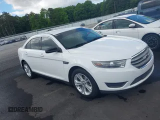 2015 Ford Taurus SE z VIN 1FAHP2D82FG188844, wystawiony jako IAAI lot #42259052 z przebiegiem 149 368 mil mil oraz . Historia ofert i sprzedaży dostępna na DreamBid. Obrazek 1.