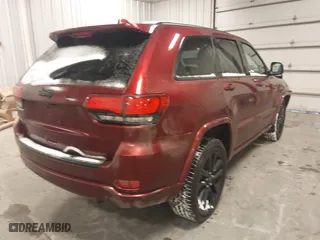 2018 Jeep Grand Cherokee Laredo E with VIN 1C4RJFAG9JC436803, listed as a IAAI auction lot 41572437 with 106,941 mi miles. Bid and sale history available at carsss.com. Image 4.