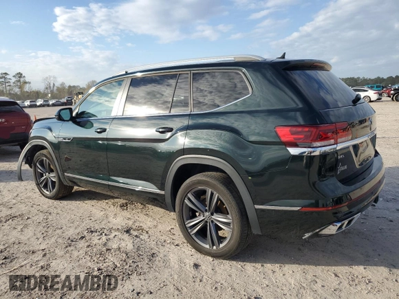 2022 Volkswagen Atlas 3.6L V6 SEL R-Line with VIN 1V2AR2CA3NC512284, listed as a Copart auction lot 86606084 with 69,638 mi miles and Salvage Title. Bid and sale history available at carsss.com. Image 2.