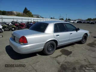 2000 Ford Crown Victoria Police Police Interceptor with VIN 2FAFP71W4YX119755, listed as a Copart auction lot 68950904 with 208,260 mi miles and Salvage Title. Bid and sale history available at carsss.com. Image 3.