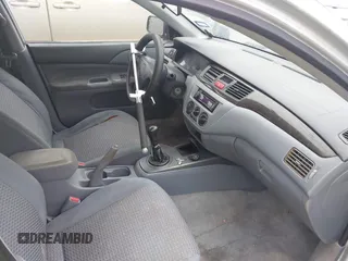 2003 Mitsubishi Lancer ES with VIN JA3AJ26E43U038813, listed as a IAAI auction lot 41778956 with 150,764 mi miles. Bid and sale history available at carsss.com. Image 5.