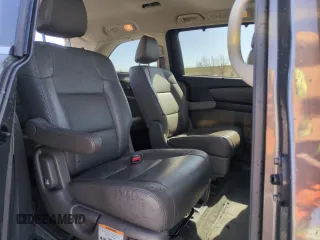2014 Honda Odyssey Touring with VIN 5FNRL5H95EB052523, listed as a Copart auction lot 52214055 with 131,350 mi miles and Salvage Title. Bid and sale history available at DreamBid. Image 11.