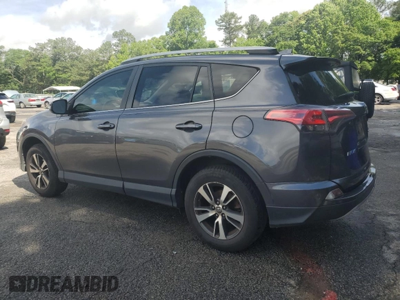 2018 Toyota RAV4 XLE with VIN JTMWFREV5JJ747297, listed as a Copart auction lot 56371505 with 215,598 mi miles and Clean Title. Bid and sale history available at DreamBid. Image 3.