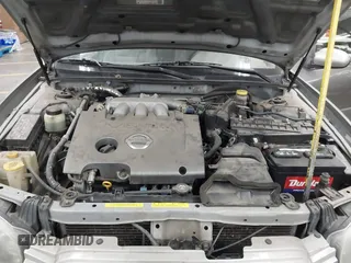 2002 Nissan Maxima GLE with VIN JN1DA31D32T422365, listed as a IAAI auction lot 41644137 with 165,157 mi miles and . Bid and sale history available at DreamBid. Image 10.