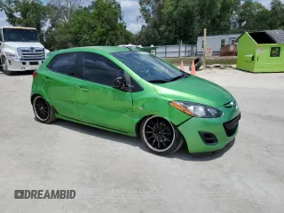 2012 Mazda 2 Sport with VIN JM1DE1KZ5C0141784, listed as a Copart auction lot 56498295 with 132,602 mi miles and Salvage Title. Bid and sale history available at DreamBid. Image 4.