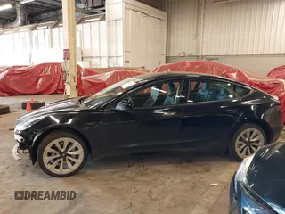 2022 Tesla Model 3 with VIN 5YJ3E1EA4NF187113, listed as a IAAI auction lot 41712331 with 81,879 mi miles and . Bid and sale history available at DreamBid. Image 15.