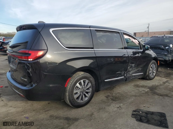 2023 Chrysler Pacifica Hybrid Limited with VIN 2C4RC1S77PR599221, listed as a Copart auction lot 82690554 with 12,013 mi miles and Salvage Title. Bid and sale history available at carsss.com. Image 3.
