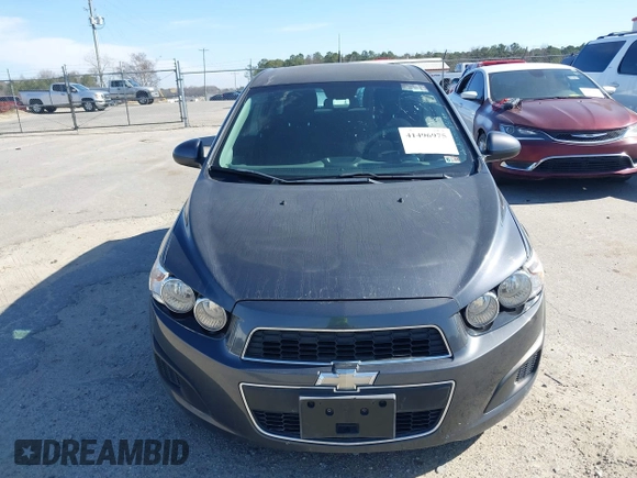2013 Chevrolet Sonic LT with VIN 1G1JC6SB1D4164944, listed as a IAAI auction lot 41496975 with 96,987 mi miles. Bid and sale history available at carsss.com. Image 16.
