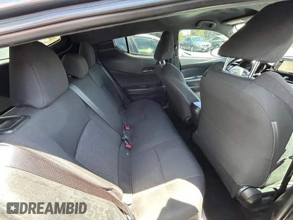 2018 Toyota C-HR XLE with VIN NMTKHMBX1JR004008, listed as a Copart auction lot 61504265 with 106,802 mi miles and Clean title. Bid and sale history available at DreamBid. Image 6.