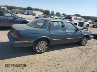 1996 Oldsmobile Cutlass Ciera 1SA VX5 z VIN 1G3AJ55M2T6328418, wystawiony jako Copart lot #77411634 z przebiegiem 29 918 mil mil oraz Szkody całkowita. Historia ofert i sprzedaży dostępna na DreamBid. Obrazek 3.
