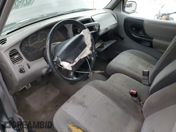 1998 Mazda B-Series Truck SX z VIN 4F4YR12C9WTM39637, wystawiony jako Copart lot #82752154 z przebiegiem 207 959 mil mil oraz Szkoda całkowita • Salvage title. Historia ofert i sprzedaży dostępna na DreamBid. Obrazek 8.