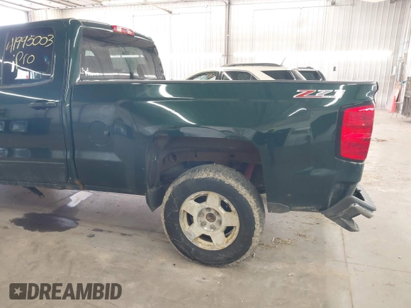 2015 Chevrolet Silverado 1500 LT with VIN 1GCVKREC2FZ147321, listed as a IAAI auction lot 41995003 with 148,053 mi miles and . Bid and sale history available at DreamBid. Image 18.