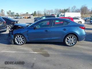 2017 Mazda 3 Touring with VIN 3MZBN1V74HM104034, listed as a IAAI auction lot 41823286 with 53,282 mi miles and . Bid and sale history available at DreamBid. Image 14.