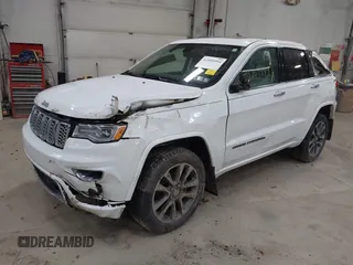 2017 Jeep Grand Cherokee Overland with VIN 1C4RJFCG7HC749730, listed as a IAAI auction lot 42009994 with 111,073 mi miles. Bid and sale history available at carsss.com. Image 2.