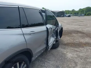 2021 Honda Pilot EX z VIN 5FNYF5H3XMB030112, wystawiony jako IAAI lot #42204148 z przebiegiem 96 182 mil mil oraz . Historia ofert i sprzedaży dostępna na DreamBid. Obrazek 6.