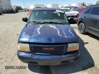 2000 GMC Sonoma SLS z VIN 1GTCS19W0Y8206050, wystawiony jako Copart lot #49122164 z przebiegiem 264 070 mil mil oraz Szkody całkowita. Historia ofert i sprzedaży dostępna na DreamBid. Obrazek 5.