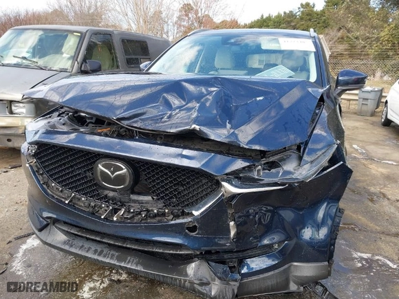 2021 Mazda CX-5 Grand Touring with VIN JM3KFADM1M1356538, listed as a IAAI auction lot 41723485 with 91,925 mi miles. Bid and sale history available at carsss.com. Image 6.