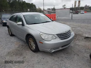 2009 Chrysler Sebring Touring *Ltd Avail* with VIN 1C3LC56BX9N517563, listed as a IAAI auction lot 41853411 with 194,215 mi miles. Bid and sale history available at carsss.com. Image 1.