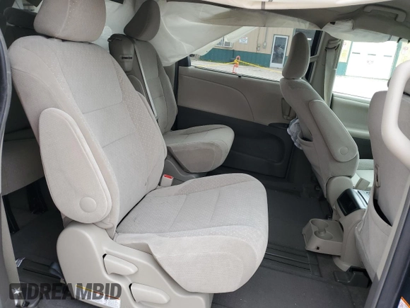 2015 Toyota Sienna LE AAS с VIN 5TDKK3DC8FS554952, выставлен на аукционе Copart как лот 54992385 с пробегом 98 399 миль миль и Списание • Salvage title. История ставок и продаж доступна на DreamBid. Изображение 11.