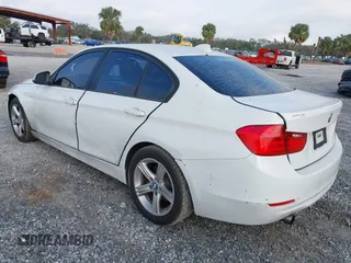 2014 BMW 3 Series 320i with VIN WBA3B1G59ENS78532, listed as a IAAI auction lot 41627172 with 133,049 mi miles. Bid and sale history available at carsss.com. Image 3.