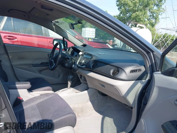 2011 Honda Insight LX z VIN JHMZE2H54BS000481, wystawiony jako IAAI lot #42368258 z przebiegiem 256 894 mil mil oraz . Historia ofert i sprzedaży dostępna na DreamBid. Obrazek 5.