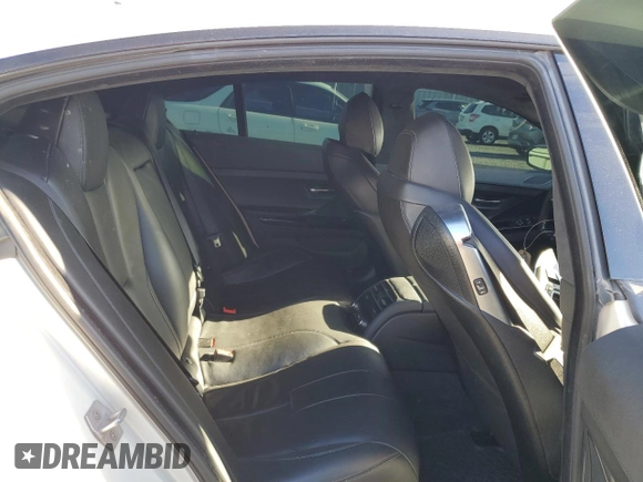 2017 BMW M6 with VIN WBS6E9C56HG437410, listed as a Copart auction lot 80217694 with 68,335 mi miles and Salvage title. Bid and sale history available at DreamBid. Image 10.