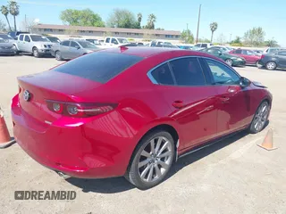 2019 Mazda 3 Premium with VIN JM1BPBEM7K1119186, listed as a IAAI auction lot 41862021 with 39,248 mi miles and . Bid and sale history available at DreamBid. Image 4.